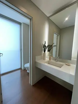 a bathroom with a sink and a mirror at Suite 107 in Funchal