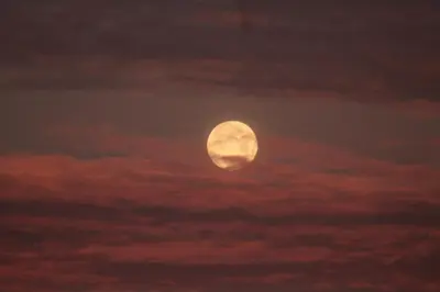 a full moon in the sky with clouds at Sea View Suite with Pool - Praia da Luz in Luz