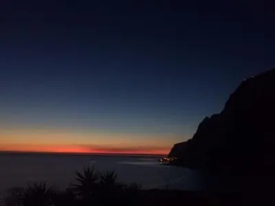 a view of the ocean at night with the horizon at Suite Bela Vigia 4 in Jardim do Mar