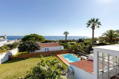 an aerial view of a house with a swimming pool at Luz Home - Three Bedroom Villa in Luz