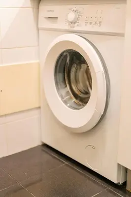 a white washer and dryer in a kitchen at Lido Escape in Funchal
