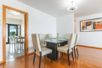 a dining room with a table and chairs at Views of Madeira by Atlantic Holiday in Ilhéu do Gorgulho