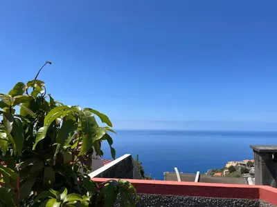 a view of the ocean from a balcony at Casa Maria in Ribeira Brava