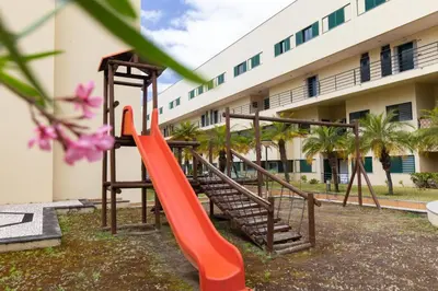 a playground in front of a building at Anadia Penthouse Duplex by Rent-a-key in Funchal