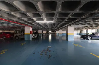 an empty parking garage with cars parked in it at Anadia Penthouse Duplex by Rent-a-key in Funchal