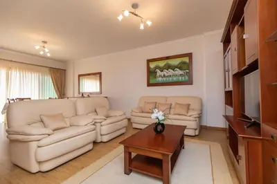 a living room with two couches and a coffee table at Anadia Penthouse Duplex by Rent-a-key in Funchal