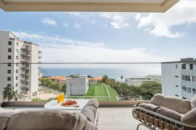 a view of the ocean from the balcony of a apartment at Casa das Raposinhas VII in Funchal