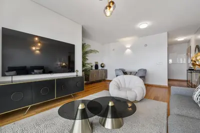 a living room with a couch and a table at The Ocean Gaze by Homie in Funchal