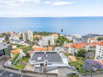 an aerial view of a city and the ocean at The Ocean Gaze by Homie in Funchal