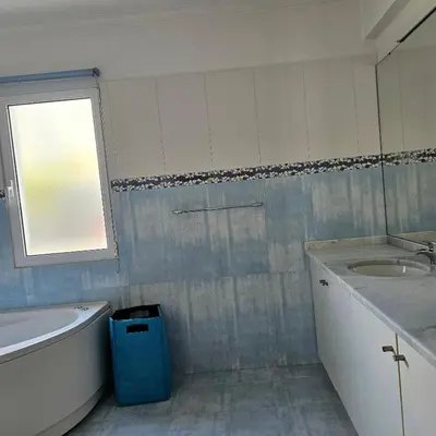 a bathroom with a tub and a sink and a bath tub at Jose & Idalina House in Funchal
