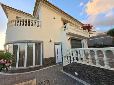 a villa with a balcony and a staircase at Jose & Idalina House in Funchal