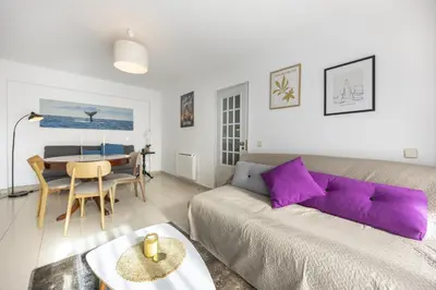 a living room with a couch and a table at CoolHouses Algarve Luz, Sunny Luz in Luz