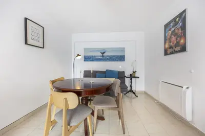 a dining room with a table and chairs at CoolHouses Algarve Luz, Sunny Luz in Luz