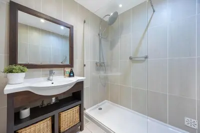 a bedroom with a view of a swimming pool at Casa Maresia da Salema in Salema