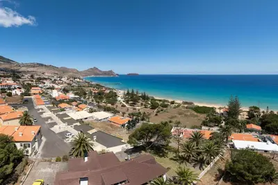 an aerial view of a town next to the ocean at Vivenda do Moinho Refuge in Porto Santo in Porto Santo