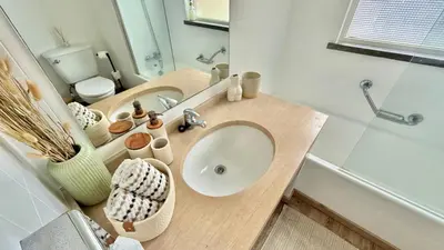 a bathroom with a sink and a toilet at MaraHomes in Funchal
