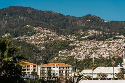 a balcony with a view of the ocean at GuestReady - Homely stay in Funchal in Funchal