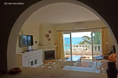 a living room with a view of the ocean at Luz dream apartment 22G above beach in Luz