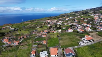 an aerial view of a small town on a hill at Casa do Prendinha A in Ponta do Pargo