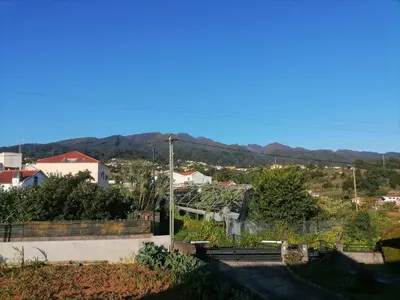 a view of a city with mountains in the background at House Vila Santa Ana in Santana