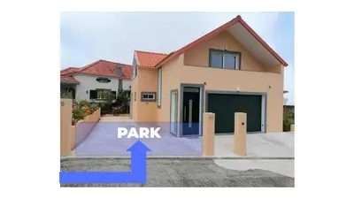 a house with a sign that says park at House Vila Santa Ana in Santana