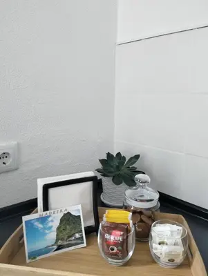 a wooden table with a tray of food on it at Casa das Grutas in São Vicente