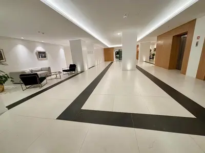 an empty lobby with black and white flooring in a building at Dream Home - everything you deserve! in Funchal