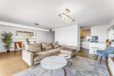 a living room with a couch and a table at Sao Lucas Apartment Top Location in Funchal