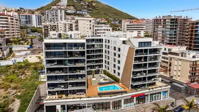 an aerial view of a city with buildings at Sao Lucas Apartment Top Location in Funchal