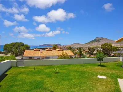 a view from the roof of a house with a yard at Golden Villa - Luxurious Beach Villa in Porto Santo