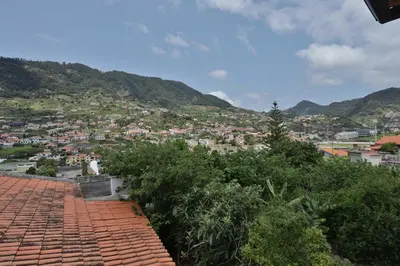 a view of a city from the roof of a house at Vila Vitalia in Machico