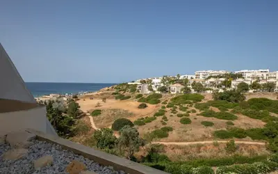 a view from the balcony of a house near the ocean at Beach View Lagos in Lagos