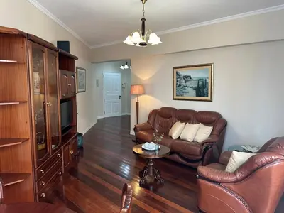 a living room with a couch and a table at Robert Apartment in Ajuda in Funchal