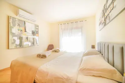 a bathroom with a toilet and a sink and a shower at Estrela Apartment by Moje Holiday in Luz