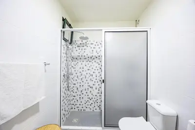a bathroom with a shower and a toilet at Serenity View by YOUR KEY in Funchal