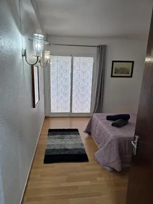 a bedroom with a bed and a window at Apartment Matur View in Machico