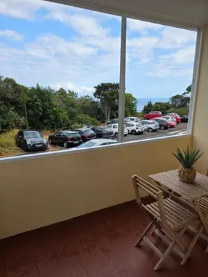 a window with a view of a parking lot at Apartment Matur View in Machico