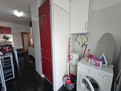 a kitchen with a washing machine in a room at Concórdia Apartment by Rentallido in Funchal