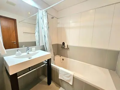 a bathroom with a sink and a bath tub at Concórdia Apartment by Rentallido in Funchal