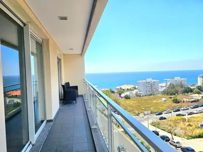 a balcony with a view of the ocean at Concórdia Apartment by Rentallido in Funchal