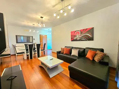 a living room with a couch and a table at Concórdia Apartment by Rentallido in Funchal