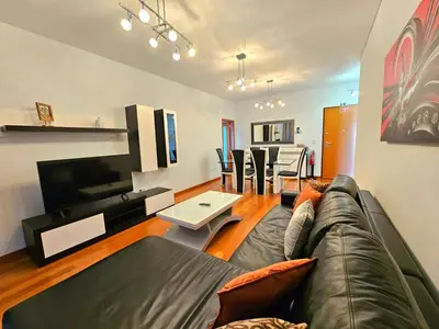 a living room with a couch and a table at Concórdia Apartment by Rentallido in Funchal