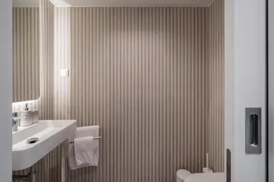 a bathroom with a sink and a toilet at Acqua Residence VIII by An Island Apart in Funchal