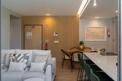 a living room with a couch and a table at Calheta Hills I by An Island Apart in Calheta