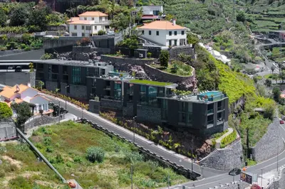 an aerial view of a building next to a road at Calheta Hills I by An Island Apart in Calheta