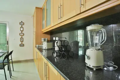 a kitchen with a blender on a counter at The Panoramic View Suites in Machico