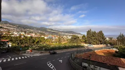 a view of a road with a city in the background at Edna 2 in Funchal