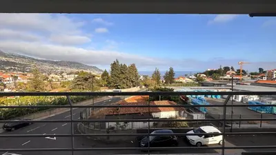 a view of a parking lot from a balcony at Edna 2 in Funchal