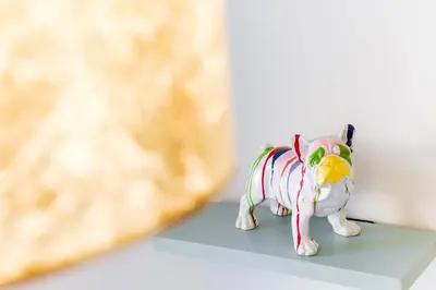 a figurine of a cat covered in candy canes at GuestReady - O Cantinho dos Pestanas in Caniço