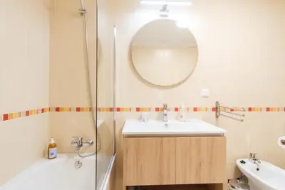 a bathroom with a sink and a shower at GuestReady - O Cantinho dos Pestanas in Caniço